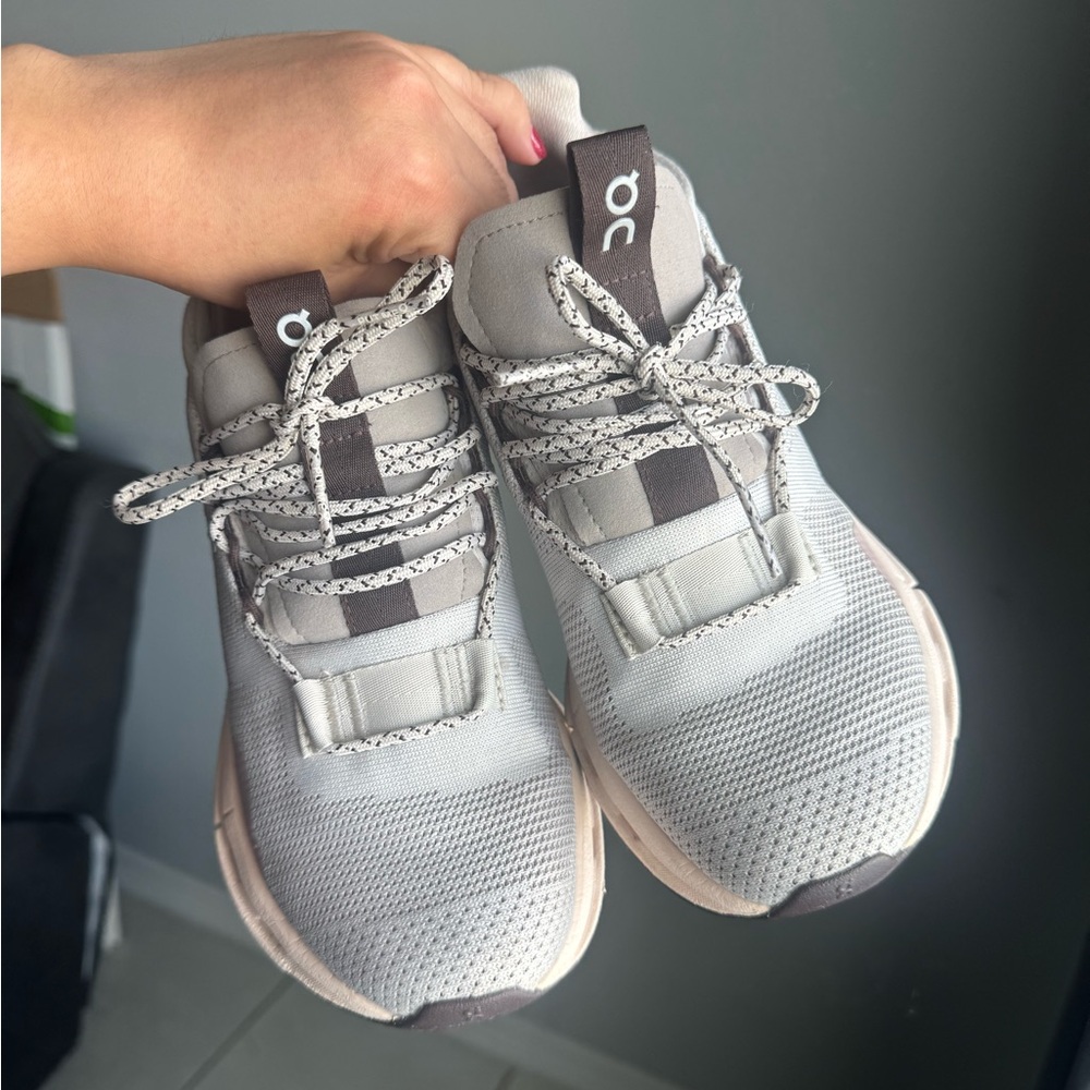 On Running Women's Athletic Shoes in tan and pink. Worn a couple times.
